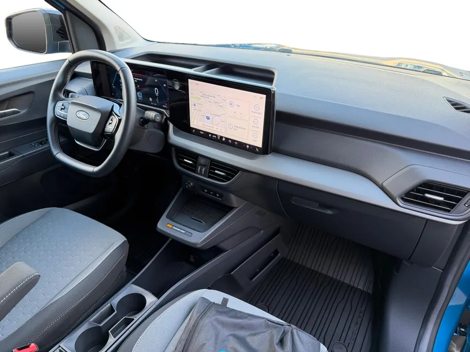 Ford E-Transit Cour. Limited 44 kWh | 1e eigenaar | Automaat | Trekhaak | Adapt. Cruise control | BLIS | Winter pack | Parkeersensoren voor en achter | Achteruitrijcamera | Navigatie | Apple carplay & Android auto | Fabrieksgarantie |