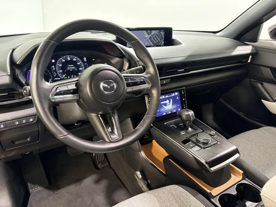 Mazda MX-30 170PK e-SkyActiv R-EV Exclusive-line Automaat | 1ste Eigenaar | Freestyle-Doors | Stoel & Stuurwiel Verwarming | Navigatie | Lichtmetalen Velgen | Dodehoek Detectie | Camera | Parkeersensoren |