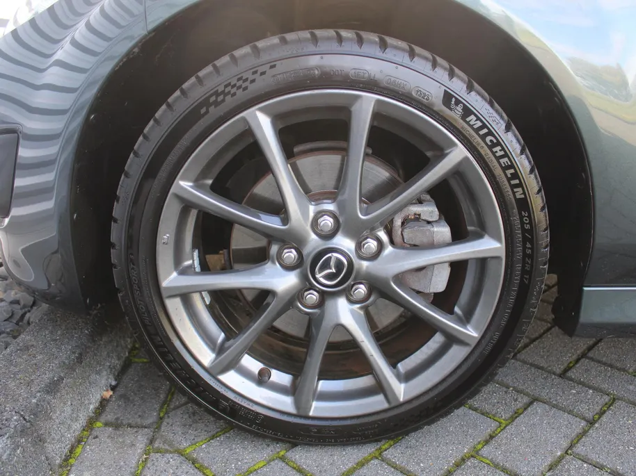Mazda MX-5 Roadster Coupé 1.8 Hanabi | Stoelverwarming | Leer | Navi | 17" LM | Cruise | Clima | Hardtop | Nieuwstaat | Ned. auto |