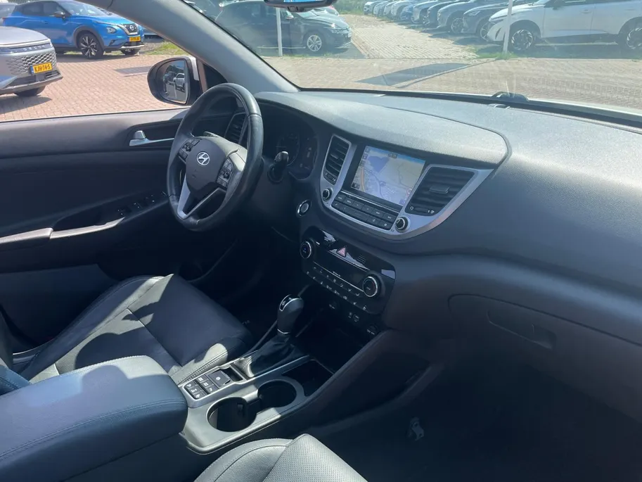 Hyundai Tucson 1.6 T-GDi Premium 4WD | STOEL VERWARMING | SCHUIFKANTELDAK | CAMERA | NAVIGATIE | ELEKTRISCHE STOEL |