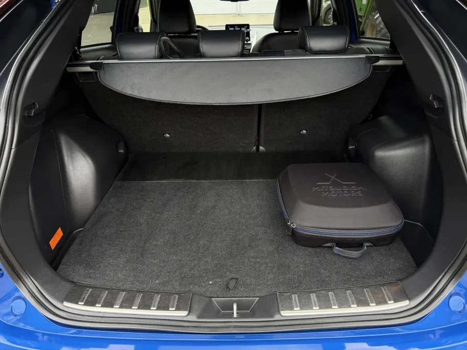 Mitsubishi Eclipse Cross 2.4 PHEV Intense+ | Stoel- en stuurverwarming | Elektrisch verstelbare stoelen | Trekhaak | Achteruitrijcamera | Parkeersensoren voor- en achter | Navi | Climate Control
