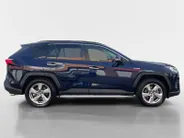 Toyota RAV4 2.5 Hybrid AWD Executive |1650 kg Trekgewicht |Trekhaak| Leer| Navigatie| Schuif-kanteldak | Verwarmbare stoelen| Adaptieve Cruise Controle| All season banden|
