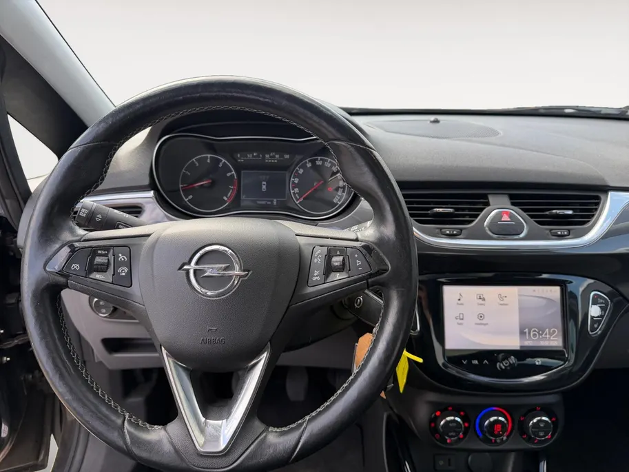 Opel Corsa 1.0 Turbo Cosmo | 100% onderhouden | NL auto | Panorama dak | Stoelverwarming | Stuurverwarming | Cruise control | Parkeersensoren voor en achter | Achteruitrijcamera | Navigatie | Bovag garantie |