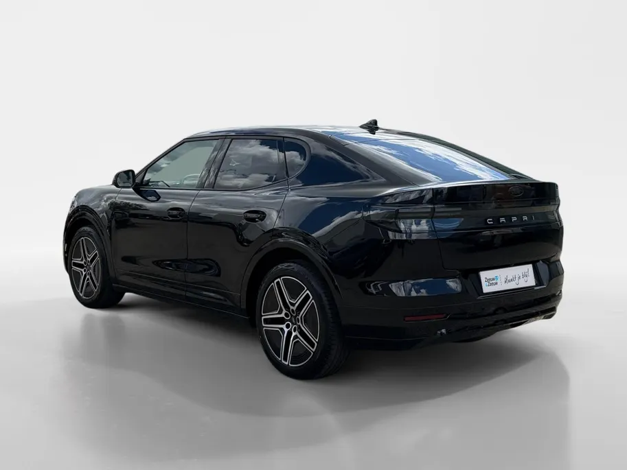 Ford Capri Premium Standard Range RWD 52 kWh | Uit Voorraad Leverbaar | €3.500,- Ready Set Ford Bonus | 374km WLTP Rijbereik | Warmtepomp | Draadloze Apple Carplay & Android Auto | B&O Premium Audio | Verwarmbare Voorstoelen | Adaptieve Cruise Control