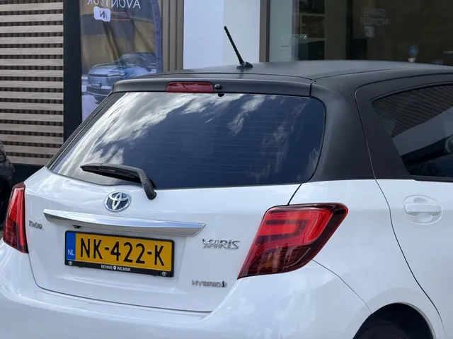 Toyota Yaris 1.5 Hybrid Trend Bi-Tone | Leer | Navigatie | LM Velgen