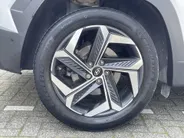 Hyundai Tucson 1.6 T-GDi HEV 230pk Aut. Premium Sky / Navigate + Camera / Schuif-kanteldak / Full Option! /