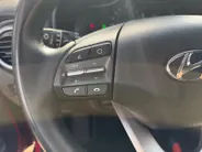 Hyundai Kona EV Fashion 64 kWh 204PK | Warmtepomp | SOH 100 % | Navigatie | Apple Carplay & Android Auto | Adaptive cruise control | Climate control | Head-up display | Parkeersensoren achter | Trekhaak |