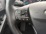 Ford Focus Wagon 1.0 EcoBoost Titanium Business | Trekhaak | HUD | Achteruitrijcamera | Winter Pack | Dodehoek detectie | Elektr. Achterklep | 12 maanden garantie! |