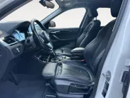 BMW X1 sDrive18i High Executive | Automaat | Head-Up Display | Automatische Achterklep | Panorama Dak | Stoelverwarming | Volledig Lederen Bekleding | Dealer Onderhouden | Camera | 12 Maanden BOVAG Garantie