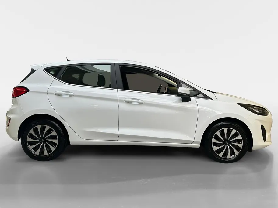 Ford Fiesta 1.0 EcoBoost Hybrid Titanium | Apple Carplay / Android Auto | Stoel + Stuurverwarming | Cruise Control | Parkeersensoren Achter | Lichtsensor | Climate Control | Verwarmbare Voorruit