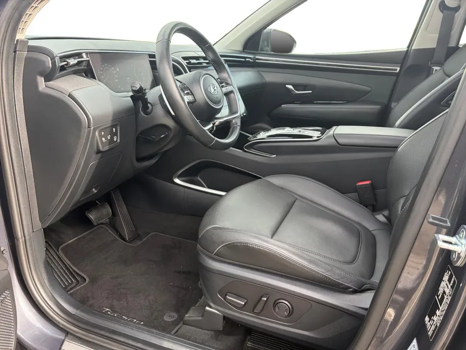 Hyundai Tucson 1.6 T-GDI HEV Premium Sky | Full options! | Elek. stoelverstelling | Schuif- kanteldak | Leder | Stoelverwarming en koeling
