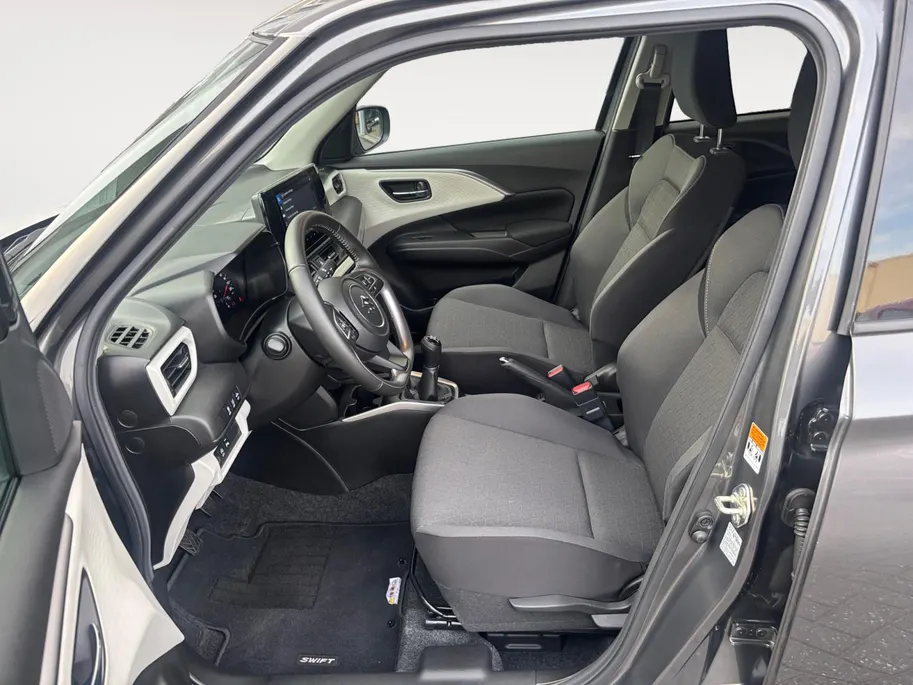 Suzuki Swift 1.2 Style Smart Hybrid | 10 jaar Fabrieksgarantie! | All-season banden | Navigatie | Achteruitrijcamera | Adapt. Cruise Control |