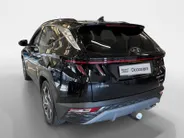 Hyundai Tucson 1.6 T-GDI PHEV Premium Sky 4WD | 66km WLTP elektrisch | Navigatie | Adaptive cruise control | Trekhaak | Apple Carplay & Android Auto | Dode hoek detectie | Draadloze telefoonlader |