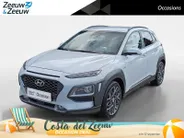 Hyundai Kona 1.6 GDI HEV Premium | Trekhaak | Apple Carplay/Android Auto | Adaptive cruise control | Dodenhoek herkenning | Leren bekleding