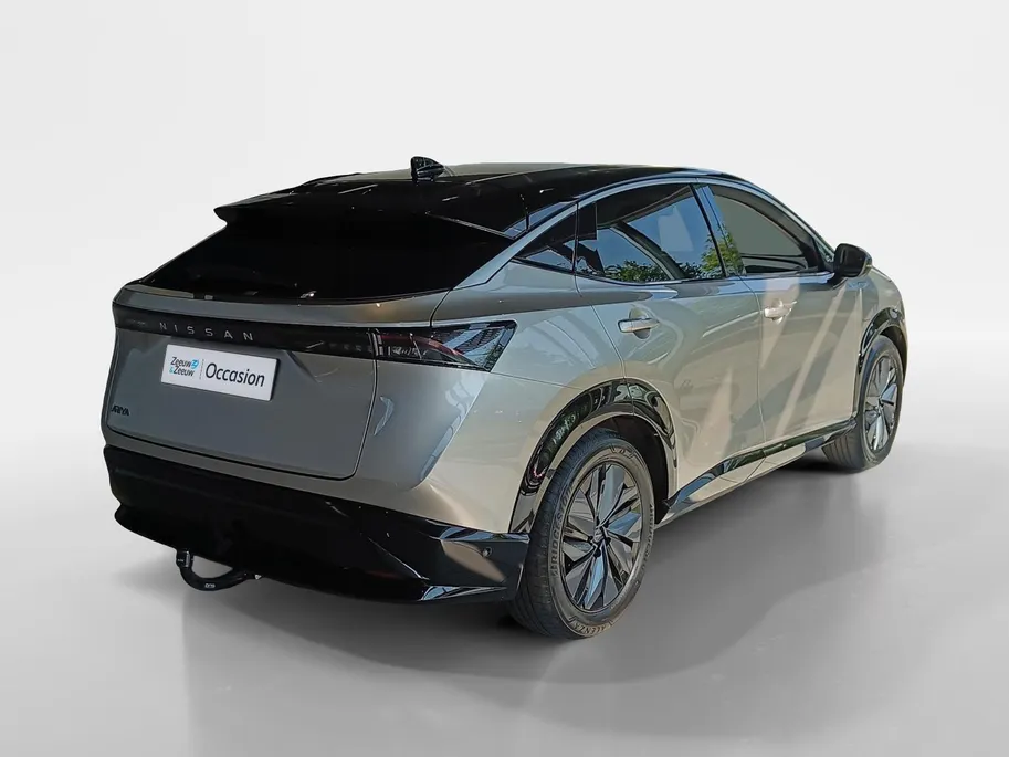 Nissan ARIYA Evolve 66 kWh | 22KW Lader| Afneembare trekhaak| Apple carplpay& Android auto| 360grd Camera| Stoelverwarming en verkoeling| Elektrisch verstelbare stoelen| Luxe bekleding| Dealer onderhouden|