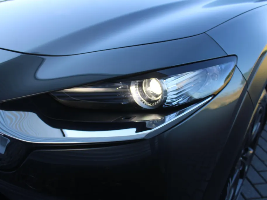 Mazda CX-30 2.0 e-SkyActiv-X M Hybrid Homura | Stoel-/stuurverwarming | Camera | 18' LM | LED | HUD | Dodehoek detectie | Elek. achterklep | Cruise adapt. |