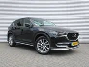 Mazda CX-5 2.0 SkyActiv-G 6AT 165PK Business Luxury | Stuur-/stoelverwarming + ventilatie | Geheugenstoel | 360 Camera | HUD | Leer | 19" LM | Dodehoek detectie | Bose |