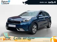 Kia Niro 1.6 GDi Hybrid DynamicLine | Trekhaak Vast + 13-Polige Stekker | All-Seasonbanden | Apple Carplay / Android Auto | Navigatiesysteem | Parkeersensoren + Camera Achter | Cruise Control | Rijstrooksensor + Correctie
