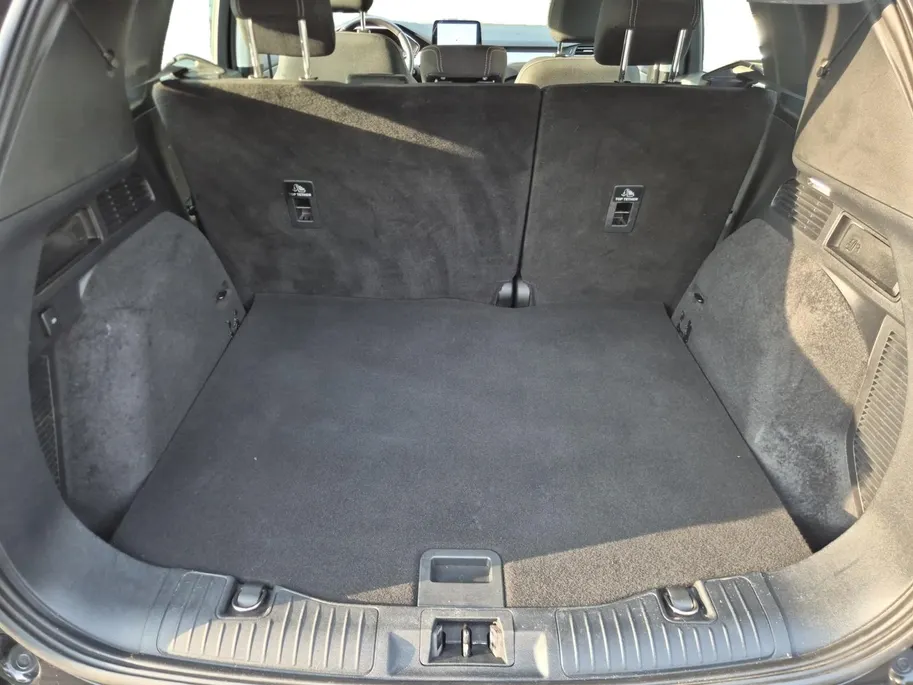 Ford Kuga 1.5 EcoBoost Titanium X | Bluetooth | Cruise Control | Climate Control | Stoelverwarming Voor en Achter | Trekhaak | LM Velgen | Parkeersensoren |