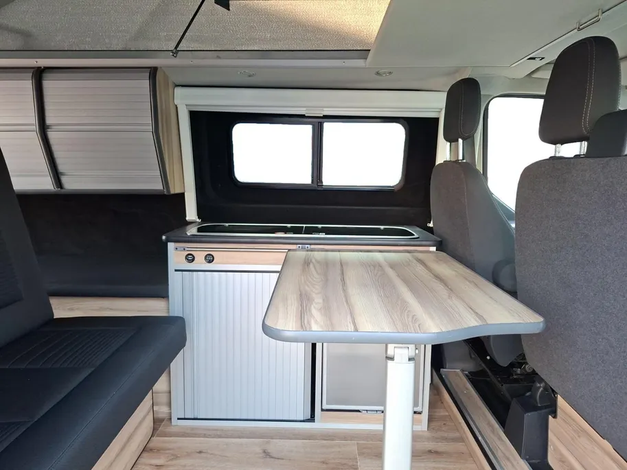 Ford Transit Custom Camper 2.0 TDCI L2H1 Limited | Distributie is vervangen | Camper met 2 slaapplaatsen | Keuken met gootsteen- koelkast- gasfornuis | Zonnescherm | Trekhaak Transit Custom Camper 2.0 TDCI L2H1 Limited | Distributie is vervangen | Camper met 2 slaapplaatsen | Keuken met gootsteen- koelkast- gasfornuis | Zonnescherm | Trekhaak