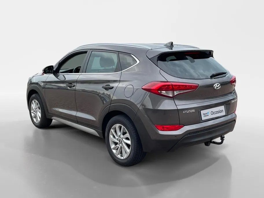 Hyundai Tucson 1.6 GDi Comfort *Navi*Camera*Trekhaak*Dual Climate Control*Cruise Control*Stoelverwarming*LM.Velgen*Zeer nette auto!
