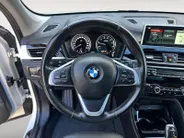 BMW X1 sDrive18i High Executive | Automaat | Head-Up Display | Automatische Achterklep | Panorama Dak | Stoelverwarming | Volledig Lederen Bekleding | Dealer Onderhouden | Camera | 12 Maanden BOVAG Garantie