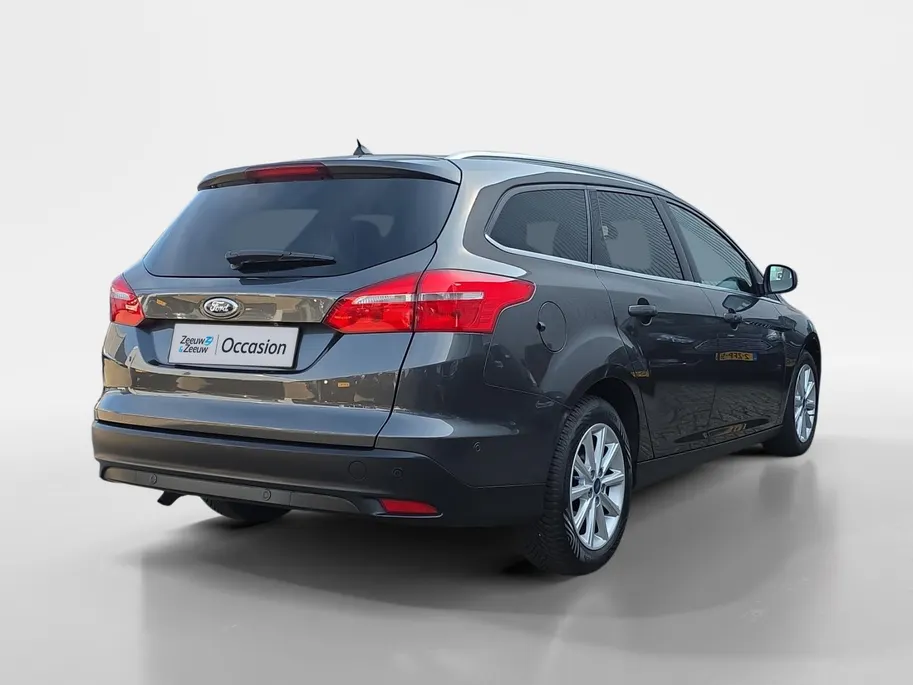 Ford Focus Wagon 1.0 Titanium | Goed onderhouden! | Apple Carplay/Android Auto | Cruise Control | Achteruitrijcamera | Climate Control | Parkeersensoren rondom | 12 maanden garantie! |