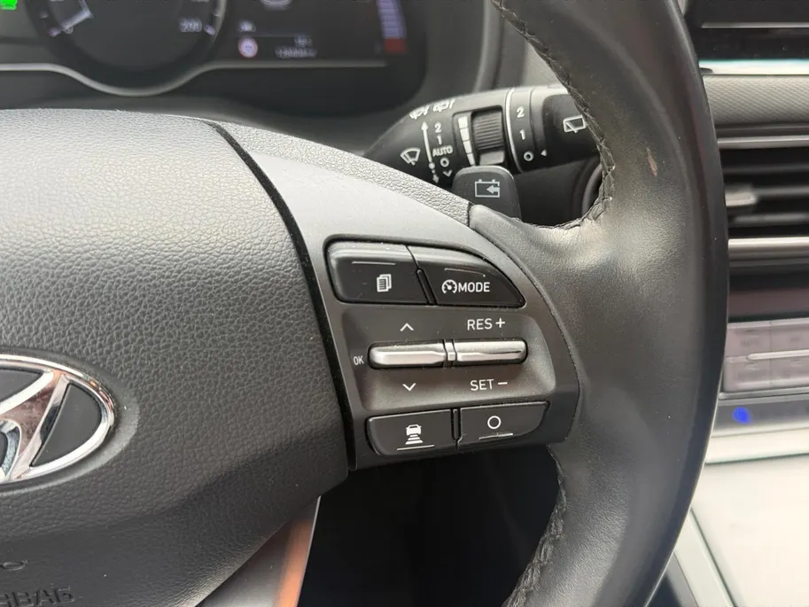 Hyundai Kona EV Premium 64 kWh | Achteruitrijcamera | Head Up Display | Dodehoek Detectie | Lederen Bekleding | Climate Control |