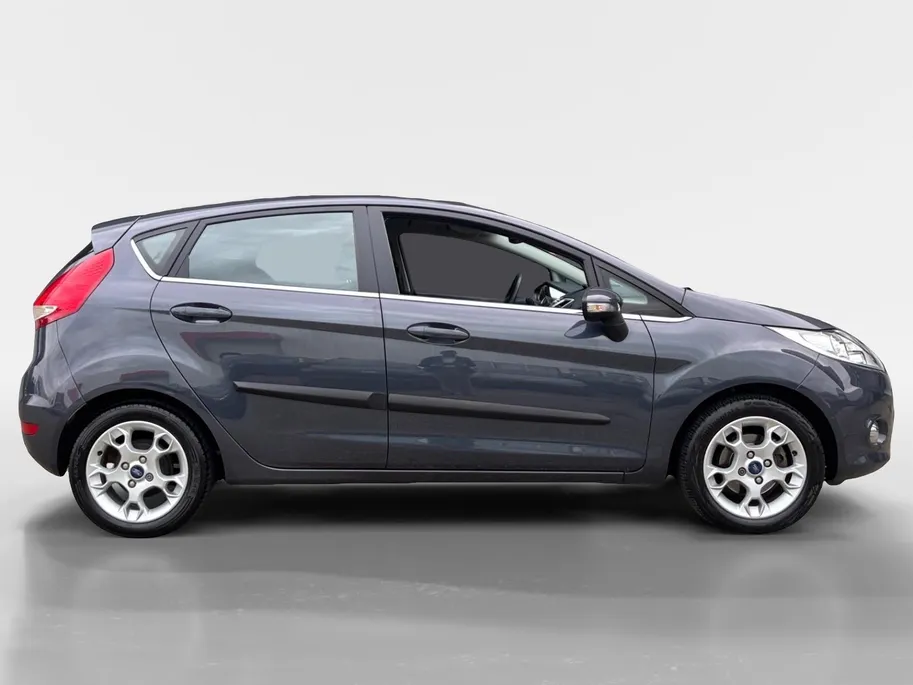 Ford Fiesta 1.4 Titanium | Voorruitverwarming | PDC | Airco | 12 maanden BOVAG garantie