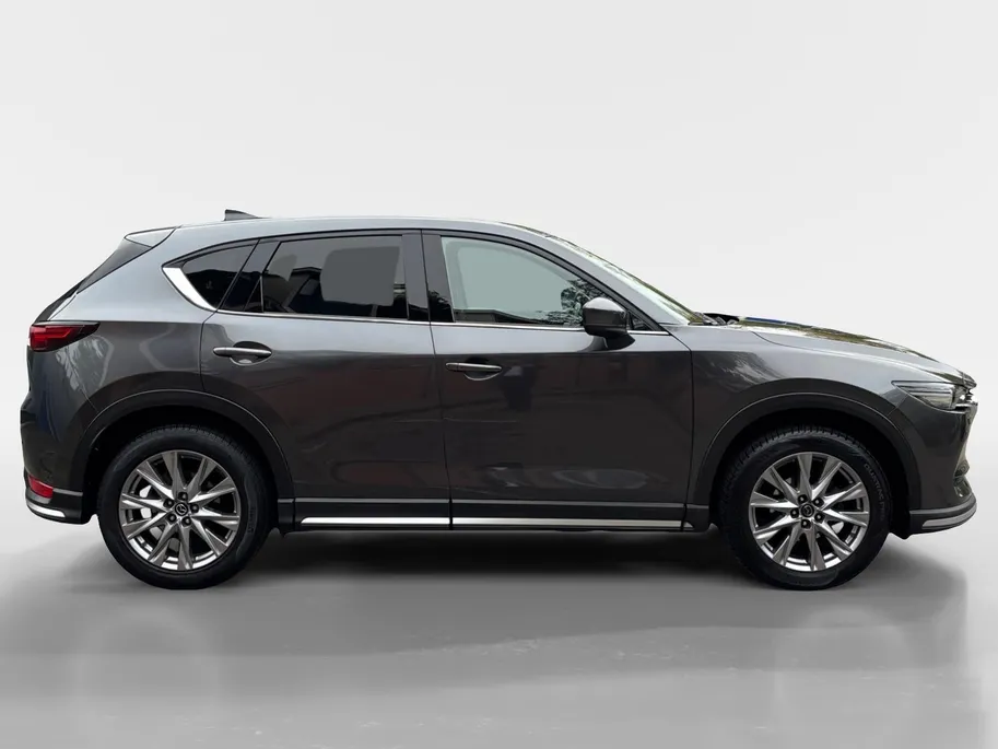 Mazda CX-5 2.0 SkyActiv-G 165 Signature | Schuif/kanteldak | 360 graden camera | Wegklapbare Trekhaak | Adaptieve Cruise Control | Navigatie | BOSE | Leder | 19' Lichtmetalen velgen