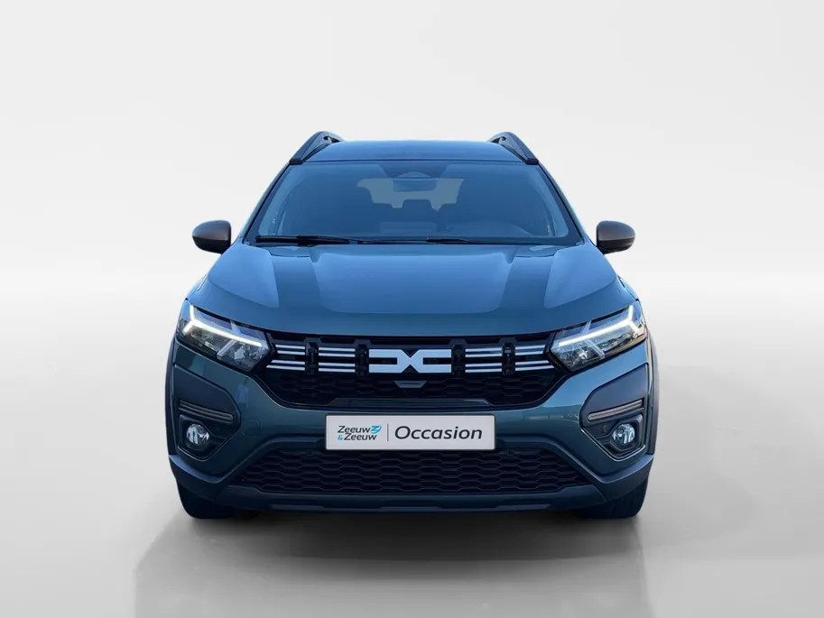 Dacia Jogger 140PK Hybrid Extreme 7p. Automaat | 7 Zitplaatsen | Camera | Parkeersensoren | Apple CarPlay/Android Auto | Digital Cockpit | Cruise Control | Lichtmetalen Velgen | Licht & Regen Sensor | Full LED |