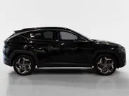 Hyundai Tucson 1.6 T-GDI PHEV Premium Sky 4WD | 66km WLTP elektrisch | Navigatie | Adaptive cruise control | Trekhaak | Apple Carplay & Android Auto | Dode hoek detectie | Draadloze telefoonlader |