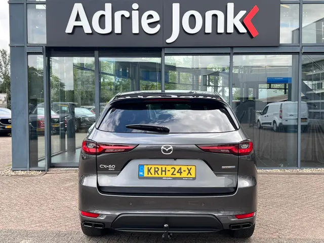 Mazda CX-60 2.5 e-SkyActiv PHEV Homura Plus | TREKHAAK |AUTOMAAT | PLUG-IN HYBDRIDE | PANORAMADAK | 2500kg TREKGEWICHT | LEDER | 360gr CAMERA | MEEST LUXE UITVOERING | BIJNA NIEUW |