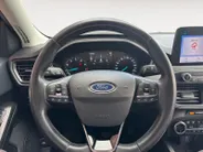 Ford Focus Wagon 1.0 EcoBoost Hybrid Titanium | Trekhaak | Stoel, stuur en voorruitverwarming | Cruise | Climate