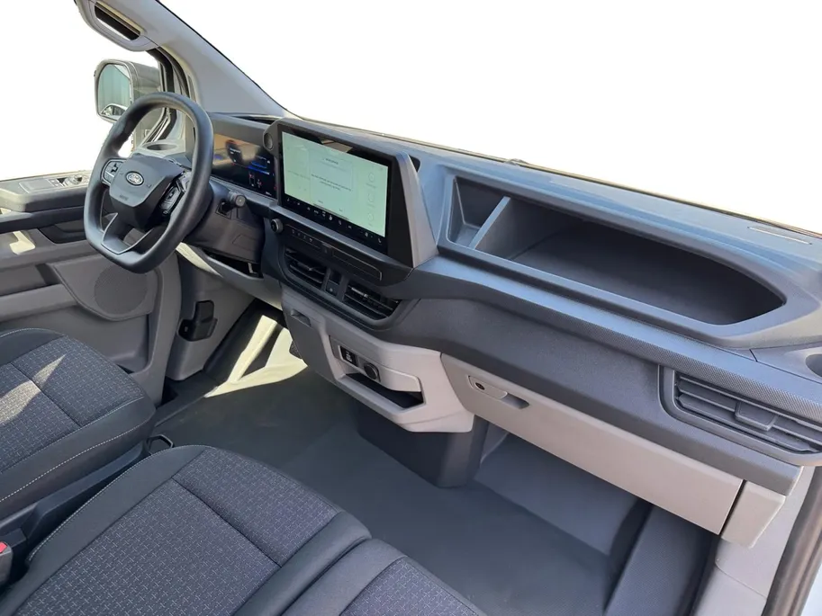 Ford E-Transit Custom 320 L1H1 Trend 71 kWh | Uit Voorraad Leverbaar | 344km WLTP Rijbereik | Achteruitrijcamera | Cruise Control | Parkeersensoren voor en achter | Verwarmbare Stoel en bijrijdersbank | Voorruitverwarming | Apple Carplay & Android Auto