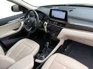 BMW X1 sDrive18i Business Edition Plus | Trekhaak | Leder | Navi | Stoelverwarming | Head-Up Display | Ambient Lighting | NL AUTO | Cruise Control | Climate Control | 12 maanden Bovag garantie |