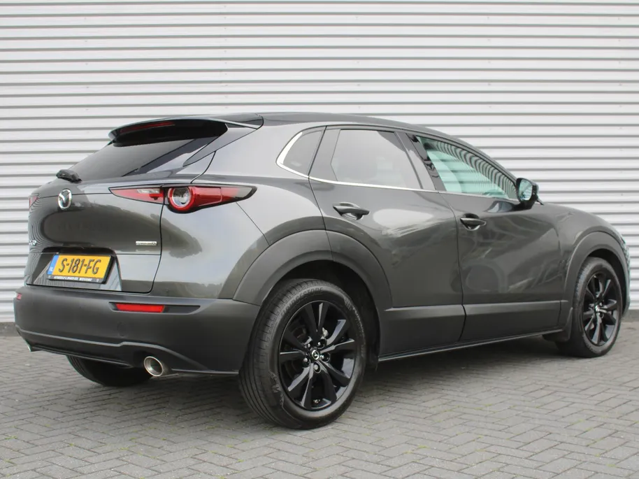 Mazda CX-30 2.0 e-SkyActiv-X M Hybrid Homura | 18' LM | Navi | Stoel-/stuurverwarming | Camera | Cruise adapt. | PDC | Dodehoek detectie | HUD | LED |