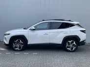 Hyundai Tucson 1.6 T-GDi HEV 230pk Aut. Premium Sky / Navigate + Camera / Schuif-kanteldak / Full Option! /