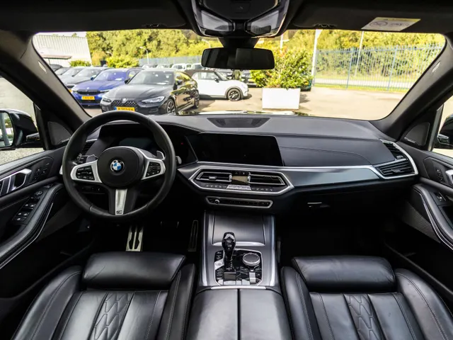 BMW X5 xDrive45e High Executive | NL geleverd | 1e Eigenaar | Achteras besturing |