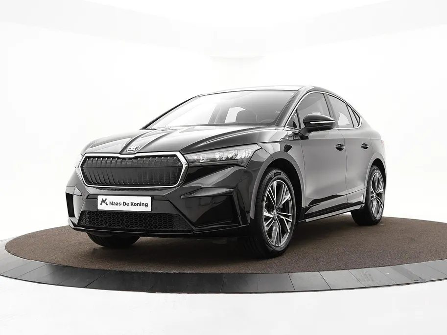 Škoda Enyaq Coupe iV 80 204pk · SOH 96,5% · Panoramadak · Camera · Apple/Android Car Play · Cruise Control · 20'Velgen · Sfeerverlichting ·
