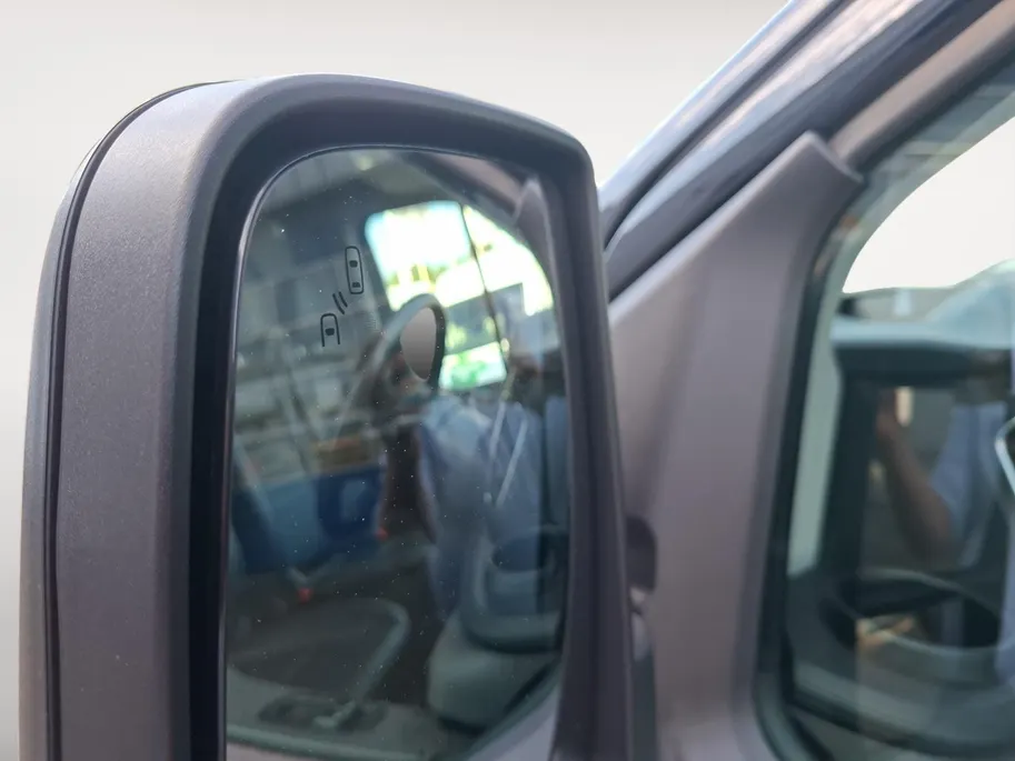 Ford Transit 350 2.0 TDCI L3H2 Trail 165 pk handgeschakeld | BPM VRIJ | Adaptive Cruise control | Navigatiesysteem | Raptor Gril | Zwarte treeplanken | LM velgen gloss black | Houten kasten links en rechts | Dakdragers met laddersysteem