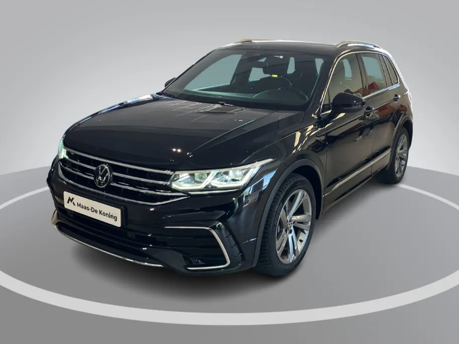 Volkswagen Tiguan 1.4TSI eHybrid 245pk R-Line Business+ · Trekhaak · Navigatie · Apple/Android · Camera + Parkeersensoren · Garantie t/m 07-10-2026 of 100000km.