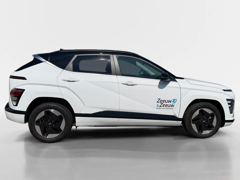 Hyundai Kona Electric Comfort Smart 64.8 kWh | TWO TONE | APPLE CARPLAY / ANDROID AUTO | SNELLADEN | PARKEERHULP | incl fabrieksgarantie!