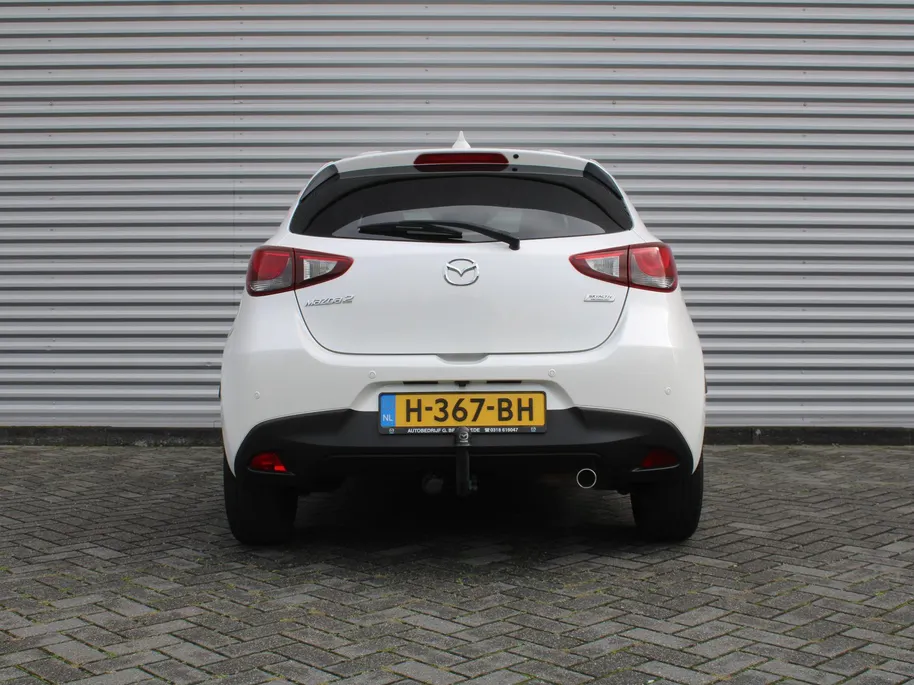 Mazda 2 1.5 Skyactiv-G GT-M | Trekhaak | Camera | Stoelverwarming | 16' LM | Navi | Cruise | Clima | Dodehoek detectie | LED | HUD |