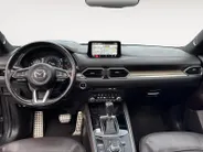 Mazda CX-5 2.0 SkyActiv-G 165 Signature | Schuif/kanteldak | 360 graden camera | Wegklapbare Trekhaak | Adaptieve Cruise Control | Navigatie | BOSE | Leder | 19' Lichtmetalen velgen