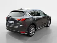 Mazda CX-5 2.0 SkyActiv-G 165 Signature | Schuif/kanteldak | 360 graden camera | Wegklapbare Trekhaak | Adaptieve Cruise Control | Navigatie | BOSE | Leder | 19' Lichtmetalen velgen