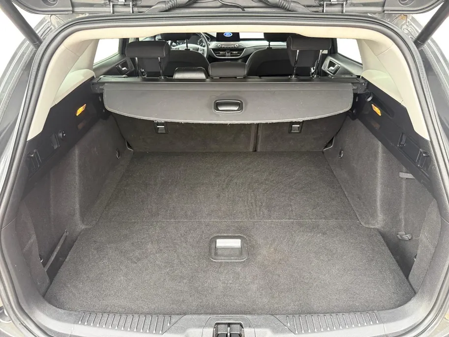 Ford Focus Wagon 1.0 EcoBoost Titanium Business | Trekhaak | HUD | Achteruitrijcamera | Winter Pack | Dodehoek detectie | Elektr. Achterklep | 12 maanden garantie! |