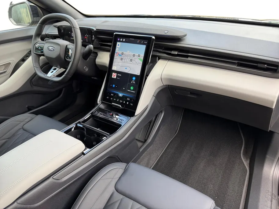 Ford Capri Premium Standard Range RWD 52 kWh | Uit Voorraad Leverbaar | €3.500,- Ready Set Ford Bonus | 374km WLTP Rijbereik | Warmtepomp | Draadloze Apple Carplay & Android Auto | B&O Premium Audio | Verwarmbare Voorstoelen | Adaptieve Cruise Control