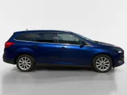 Ford Focus Wagon 1.0 Titanium 125 pk | Airco | Navigatie | LM Velgen | Dealer onderhouden!
