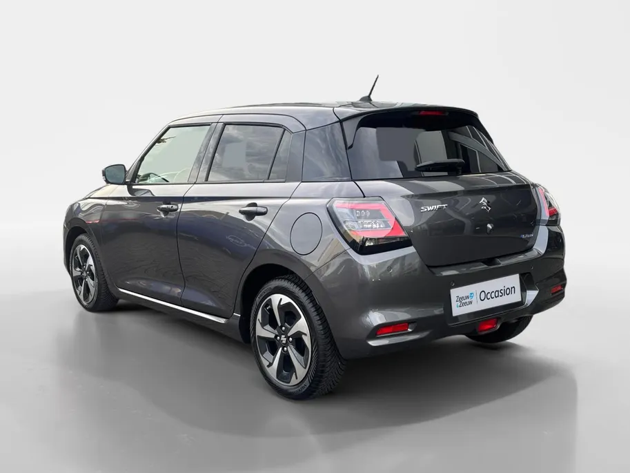 Suzuki Swift 1.2 Style Smart Hybrid | 10 jaar Fabrieksgarantie! | All-season banden | Navigatie | Achteruitrijcamera | Adapt. Cruise Control |